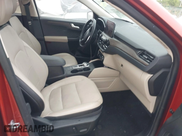 2020 Ford Escape Titanium Hybrid with VIN 1FMCU0DZ1LUB13684, listed as a IAAI auction lot 41629782 with 31,669 mi miles and . Bid and sale history available at DreamBid. Image 5.