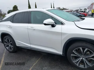 2020 Lexus RX with VIN 2T2HGMDA1LC052493, listed as a IAAI auction lot 41450535 with 63,547 mi miles. Bid and sale history available at carsss.com. Image 13.
