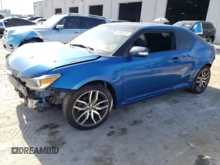 2014 Scion tC z VIN JTKJF5C74E3079471, wystawiony jako Copart lot #56996455 z przebiegiem 86 874 mil mil oraz Nie do naprawy. Historia ofert i sprzedaży dostępna na DreamBid. Obrazek 1.