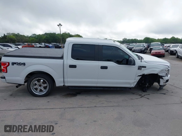 2018 Ford F-150 XL with VIN 1FTEW1E54JFB51565, listed as a IAAI auction lot 41942276 with 131,864 mi miles. Bid and sale history available at carsss.com. Image 14.