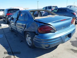 1999 Pontiac Grand Am SE1 with VIN 1G2NE52E6XM791901, listed as a IAAI auction lot 41397903 with 61,349 mi miles. Bid and sale history available at carsss.com. Image 3.