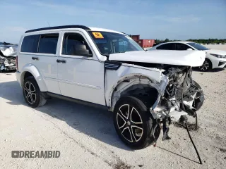 2011 Dodge Nitro SE z VIN 1D4PT2GK3BW520236, wystawiony jako Copart lot #64354194 z przebiegiem Nie podano mil oraz Szkoda całkowita • Salvage title. Historia ofert i sprzedaży dostępna na DreamBid. Obrazek 4.