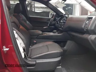 2023 Nissan Pathfinder Rock Creek with VIN 5N1DR3BD7PC276625, listed as a IAAI auction lot 42226402 with 11,872 mi miles and . Bid and sale history available at DreamBid. Image 5.