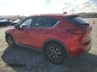 2018 Mazda CX-5 Touring with VIN JM3KFACM6J0334327, listed as a Copart auction lot 47863595 with 68,070 mi miles and Salvage Title. Bid and sale history available at carsss.com. Image 2.