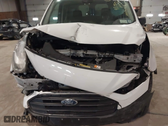 2019 Ford Transit Connect XL z VIN NM0LS6E25K1425678, wystawiony jako IAAI lot #41287172 z przebiegiem 99 130 mil mil oraz . Historia ofert i sprzedaży dostępna na DreamBid. Obrazek 6.