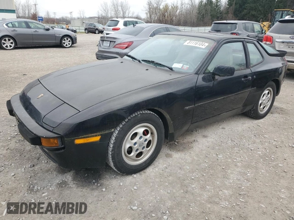 1987 Porsche 944 z VIN WP0AB0944HN473323, wystawiony jako Copart lot #81116104 z przebiegiem 121 255 mil mil oraz Czysty tytuł • Clean title. Historia ofert i sprzedaży dostępna na DreamBid. Obrazek 1.