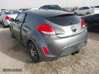2015 Hyundai Veloster RE:FLEX with VIN KMHTC6AD1FU232984, listed as a IAAI auction lot 41570593 with 180,435 mi miles. Bid and sale history available at carsss.com. Image 3.