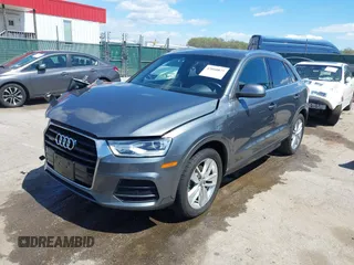 2017 Audi Q3 Premium Plus z VIN WA1JCCFS5HR003127, wystawiony jako IAAI lot #42060877 z przebiegiem 78 881 mil mil oraz . Historia ofert i sprzedaży dostępna na DreamBid. Obrazek 17.