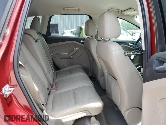 2015 Ford Escape Titanium with VIN 1FMCU0JX5FUC90567, listed as a Copart auction lot 60340775 with 67,287 mi miles and Salvage title. Bid and sale history available at DreamBid. Image 11.