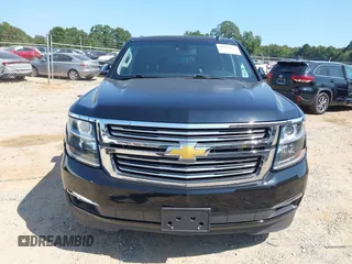 2015 Chevrolet Suburban LTZ with VIN 1GNSKKKC7FR205638, listed as a IAAI auction lot 40284367 with 103,530 mi miles and . Bid and sale history available at DreamBid. Image 12.
