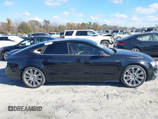 2013 Audi A7 3.0 Prestige with VIN WAU2GAFC2DN065112, listed as a IAAI auction lot 41117426 with 159,105 mi miles. Bid and sale history available at carsss.com. Image 14.