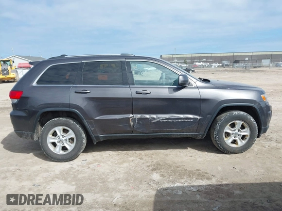 2015 Jeep Grand Cherokee Laredo with VIN 1C4RJFAG6FC140581, listed as a IAAI auction lot 41869952 with 193,295 mi miles. Bid and sale history available at carsss.com. Image 13.