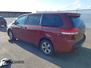 2012 Toyota Sienna with VIN 5TDKA3DC0CS013845, listed as a IAAI auction lot 42010389 with 209,272 mi miles and . Bid and sale history available at DreamBid. Image 3.
