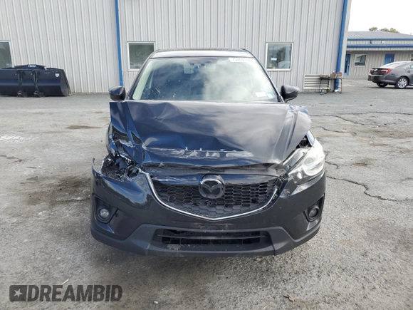 2015 Mazda CX-5 Grand Touring with VIN JM3KE4DY2F0480639, listed as a Copart auction lot 75248594 with 104,652 mi miles and Non Repairable. Bid and sale history available at carsss.com. Image 5.