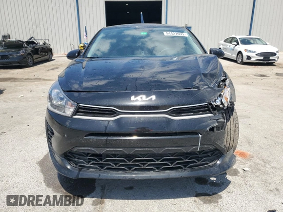 2023 Kia Rio LX with VIN 3KPA24AD3PE577081, listed as a Copart auction lot 54427095 with 18,292 mi miles and Non Repairable. Bid and sale history available at DreamBid. Image 5.