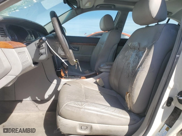 2005 Kia Amanti with VIN KNALD124455063679, listed as a Copart auction lot 50058595 with 179,132 mi miles and Salvage Title. Bid and sale history available at carsss.com. Image 7.