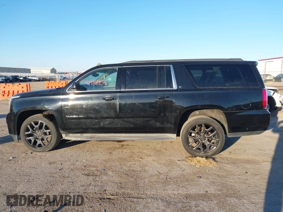 2015 GMC Yukon XL SLT with VIN 1GKS1HKC3FR250207, listed as a IAAI auction lot 41424234 with 183,233 mi miles. Bid and sale history available at carsss.com. Image 14.
