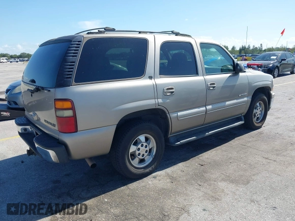 2001 Chevrolet Tahoe LS with VIN 1GNEC13T31J128812, listed as a IAAI auction lot 42855462 with 268,691 mi miles and . Bid and sale history available at DreamBid. Image 4.