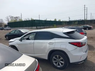 2019 Lexus RX 350 with VIN 2T2BZMCA3KC210705, listed as a IAAI auction lot 42094669 with 57,070 mi miles and . Bid and sale history available at DreamBid. Image 14.