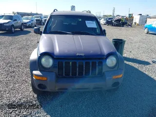 2003 Jeep Liberty Sport with VIN 1J4GL48K83W663248, listed as a IAAI auction lot 42056561 with 161,652 mi miles. Bid and sale history available at carsss.com. Image 12.