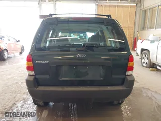 2003 Ford Escape XLS Popular with VIN 1FMYU02143KC35891, listed as a IAAI auction lot 41599760 with 148,381 mi miles. Bid and sale history available at carsss.com. Image 17.