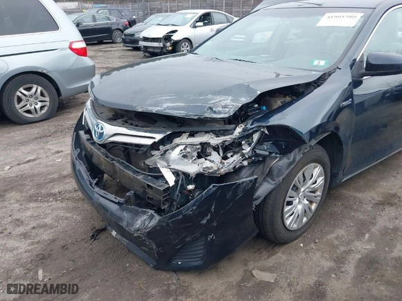2013 Toyota Camry Hybrid LE with VIN 4T1BD1FK7DU078328, listed as a IAAI auction lot 41801580 with 157,465 mi miles. Bid and sale history available at carsss.com. Image 6.