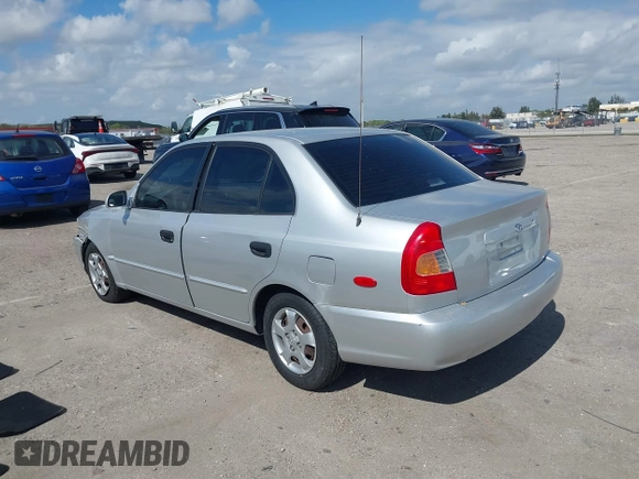 2002 Hyundai Accent GL with VIN KMHCG45C82U268756, listed as a IAAI auction lot 41569829 with 89,752 mi miles. Bid and sale history available at carsss.com. Image 3.