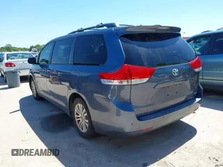 2014 Toyota Sienna XLE with VIN 5TDYK3DC5ES481399, listed as a IAAI auction lot 42085550 with 154,157 mi miles. Bid and sale history available at carsss.com. Image 3.
