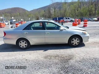 2004 Toyota Camry LE with VIN 4T1BE30K14U290983, listed as a IAAI auction lot 41983078 with 174,852 mi miles and . Bid and sale history available at carsss.com. Image 13.