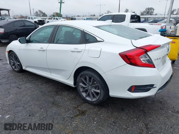 2021 Honda Civic Sedan EX-L with VIN 19XFC1F77ME205128, listed as a IAAI auction lot 41562202 with 82,257 mi miles. Bid and sale history available at carsss.com. Image 3.