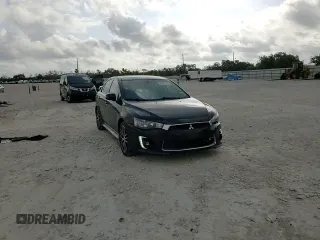 2016 Mitsubishi Lancer GT with VIN JA32U8FWXGU008597, listed as a Copart auction lot 59891435 with 131,632 mi miles and Salvage title. Bid and sale history available at DreamBid. Image 13.