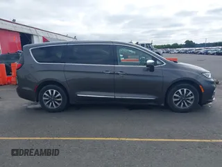 2022 Chrysler Pacifica Hybrid Limited with VIN 2C4RC1S72NR123083, listed as a IAAI auction lot 42623725 with 36,789 mi miles and . Bid and sale history available at DreamBid. Image 13.