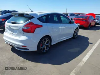 2014 Ford Focus ST with VIN 1FADP3L92EL341579, listed as a IAAI auction lot 42106528 with 104,150 mi miles and . Bid and sale history available at carsss.com. Image 4.