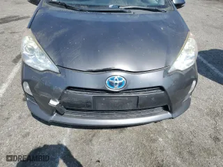 2014 Toyota Prius c One with VIN JTDKDTB34E1573233, listed as a Copart auction lot 54385895 with 107,094 mi miles and Clean Title. Bid and sale history available at carsss.com. Image 11.