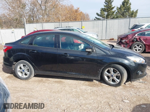 2013 Ford Focus SE z VIN 1FADP3F28DL312357, wystawiony jako IAAI lot #41798311 z przebiegiem 98 280 mil mil oraz . Historia ofert i sprzedaży dostępna na DreamBid. Obrazek 13.