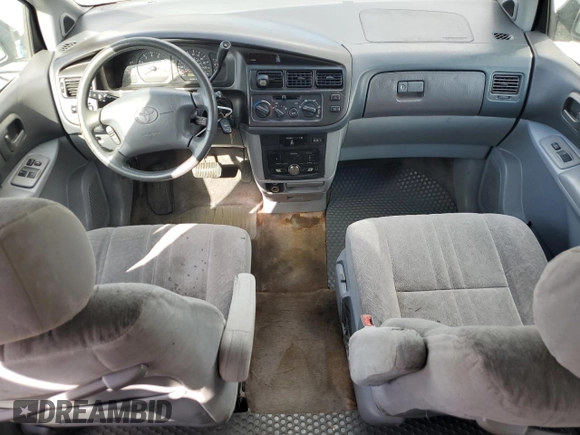 1999 Toyota Sienna LE with VIN 4T3ZF13C6XU128055, listed as a Copart auction lot 81100934 with 0 mi miles and Salvage Title. Bid and sale history available at carsss.com. Image 8.