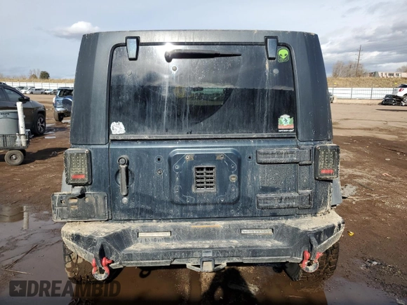2007 Jeep Wrangler Unlimited Rubicon with VIN 1J4GA69177L100903, listed as a Copart auction lot 81321154 with 130,632 mi miles and Salvage title. Bid and sale history available at DreamBid. Image 6.
