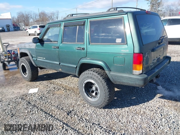 2001 Jeep Cherokee Sport with VIN 1J4FF58S41L619254, listed as a IAAI auction lot 41596384 with 180,826 mi miles and . Bid and sale history available at DreamBid. Image 3.
