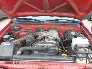 1995 Toyota T100 DX with VIN JT4VD12E6S0005957, listed as a IAAI auction lot 41943578 with 128,489 mi miles. Bid and sale history available at carsss.com. Image 10.
