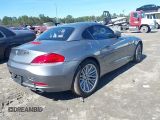 2011 BMW Z4 sDrive35i with VIN WBALM7C59BE382730, listed as a IAAI auction lot 41610401 with 113,375 mi miles. Bid and sale history available at carsss.com. Image 4.