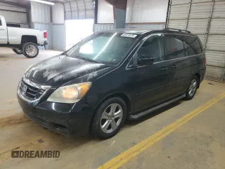 2010 Honda Odyssey Touring with VIN 5FNRL3H94AB061471, listed as a Copart auction lot 64370375 with 154,591 mi miles and Salvage title. Bid and sale history available at DreamBid. Image 1.