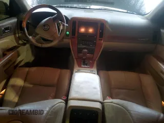 2006 Cadillac STS with VIN 1G6DC67A260208841, listed as a Copart auction lot 43142645 with 165,684 mi miles and Salvage Title. Bid and sale history available at DreamBid. Image 8.