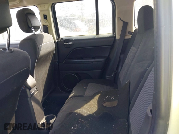 2013 Jeep Patriot Sport with VIN 1C4NJRBB6DD262920, listed as a IAAI auction lot 41779403 with 145,444 mi miles and . Bid and sale history available at carsss.com. Image 8.