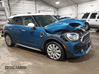 2017 MINI Countryman Cooper S z VIN WMZYT5C33H3D80283, wystawiony jako IAAI lot #41447521 z przebiegiem 78 070 mil mil oraz . Historia ofert i sprzedaży dostępna na DreamBid. Obrazek 1.