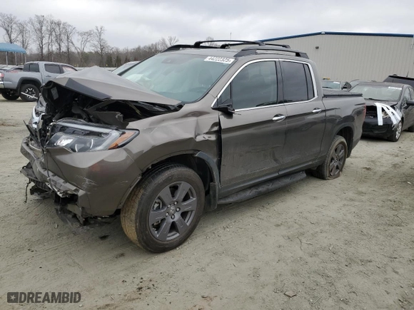 2020 Honda Ridgeline RTL-E with VIN 5FPYK3F73LB001983, listed as a Copart auction lot 44222325 with 86,782 mi miles and Salvage Title. Bid and sale history available at carsss.com. Image 1.