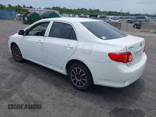 2009 Toyota Corolla with VIN 1NXBU40E09Z126070, listed as a IAAI auction lot 42196014 with 165,131 mi miles and . Bid and sale history available at DreamBid. Image 3.