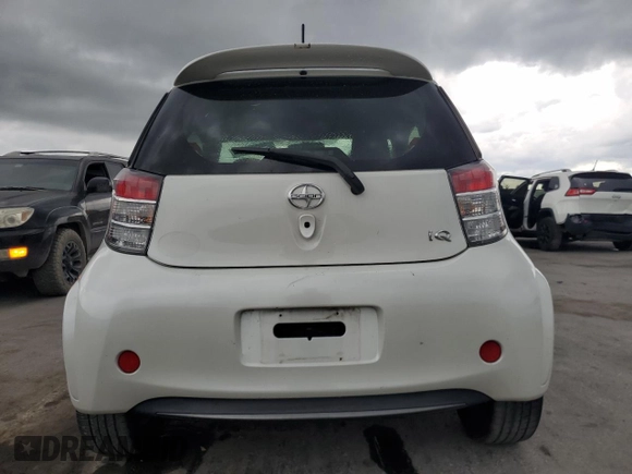 2013 Scion iQ with VIN JTNJJXB01DJ022687, listed as a Copart auction lot 61918195 with 117,483 mi miles and Salvage title. Bid and sale history available at DreamBid. Image 6.