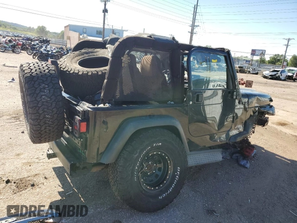 2004 Jeep Wrangler Sport with VIN 1J4FA49S04P751464, listed as a Copart auction lot 61686865 with Not provided miles and Salvage title. Bid and sale history available at DreamBid. Image 3.