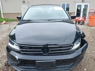 2017 Volkswagen Jetta S z VIN 3VW2B7AJ3HM303198, wystawiony jako IAAI lot #42651056 z przebiegiem 126 253 mil mil oraz . Historia ofert i sprzedaży dostępna na DreamBid. Obrazek 13.