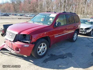 2006 GMC Envoy SLE with VIN 1GKDT13S062267555, listed as a IAAI auction lot 41850018 with 199,196 mi miles. Bid and sale history available at carsss.com. Image 18.